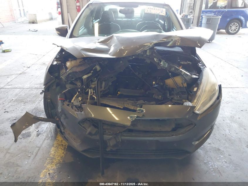 2015 Ford Focus Titanium VIN: 1FADP3J28FL294811 Lot: 43647162