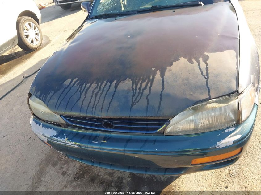 1995 Toyota Camry Le VIN: 4T1SK12E5SU870948 Lot: 43647236