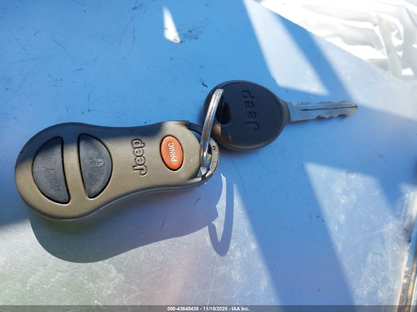 2002 Jeep Grand Cherokee Overland VIN: 1J8GW68J12C147922 Lot: 43648438