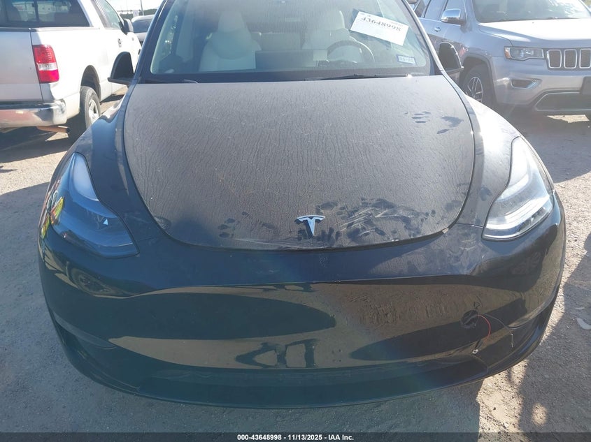 2024 Tesla Model Y Long Range Dual Motor All-Wheel Drive VIN: 7SAYGDEE1RA294842 Lot: 43648998