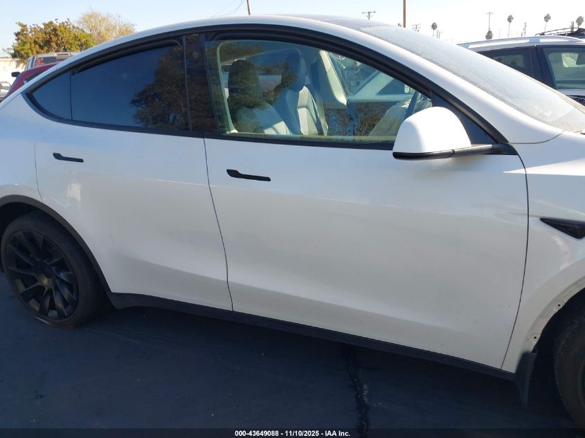 2023 Tesla Model Y Awd/Long Range Dual Motor All-Wheel Drive VIN: 7SAYGAEE5PF596536 Lot: 43649088