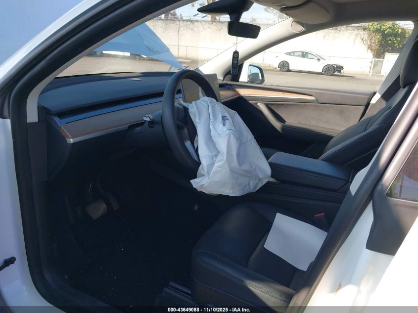 2023 Tesla Model Y Awd/Long Range Dual Motor All-Wheel Drive VIN: 7SAYGAEE5PF596536 Lot: 43649088