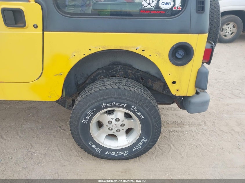 2000 Jeep Wrangler Sport VIN: 1J4FA49S2YP735627 Lot: 43649472