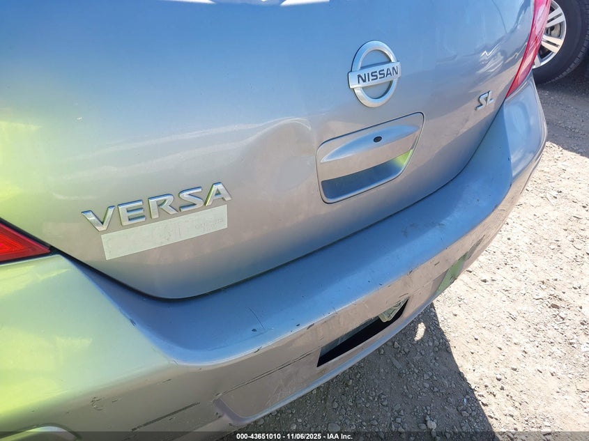 2009 Nissan Versa 1.8Sl VIN: 3N1BC13E19L414131 Lot: 43651010