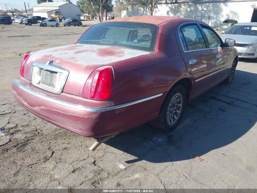 1LNHM82W7XY654671 1999 LINCOLN TOWN CAR photo no. 4