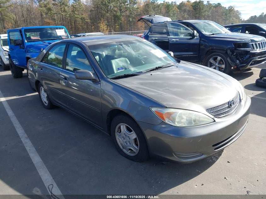 2002 Toyota Camry Le V6 VIN: 4T1BF32K72U514989 Lot: 43651656