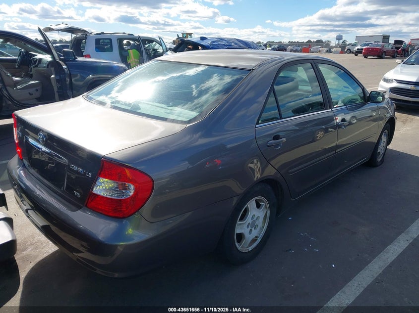 2002 Toyota Camry Le V6 VIN: 4T1BF32K72U514989 Lot: 43651656