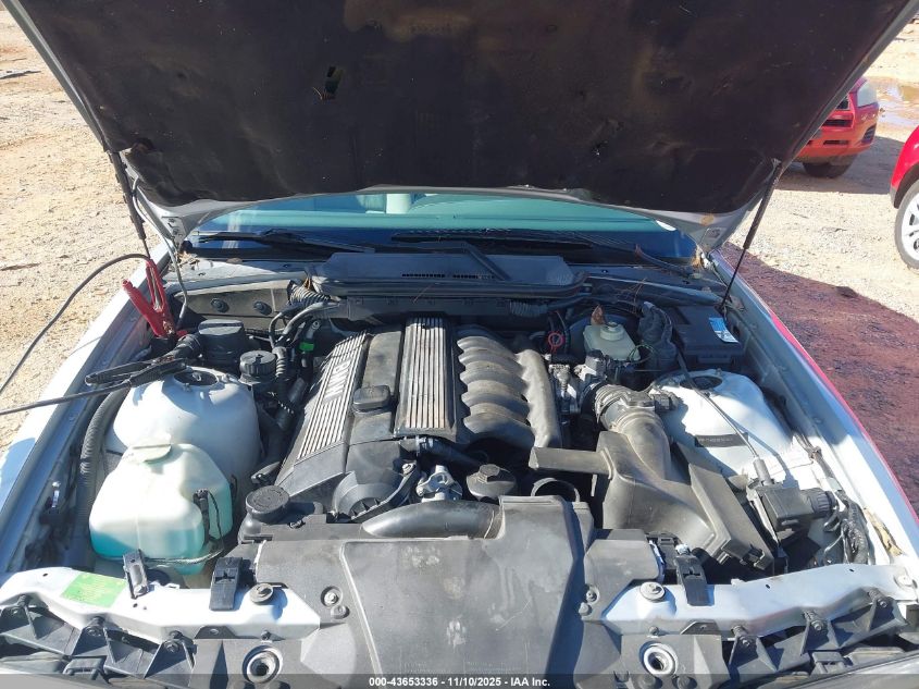 1999 BMW 323Ic VIN: WBABJ8334XEM25144 Lot: 43653336