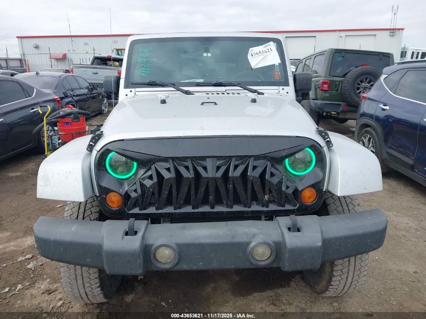 2007 Jeep Wrangler Sahara VIN: 1J8FA54127L159675 Lot: 43653621
