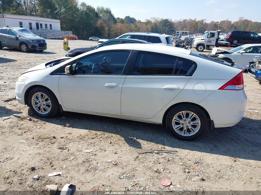 2011 Honda Insight Ex VIN: JHMZE2H74BS004399 Lot: 43653634
