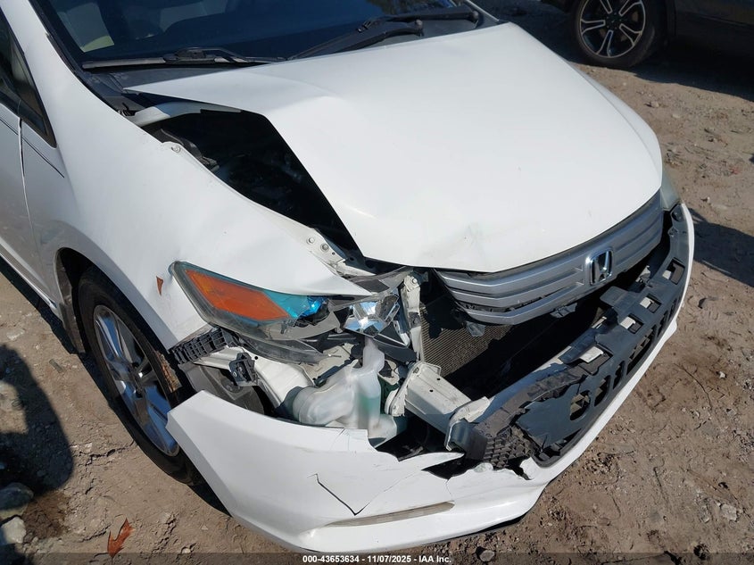 2011 Honda Insight Ex VIN: JHMZE2H74BS004399 Lot: 43653634