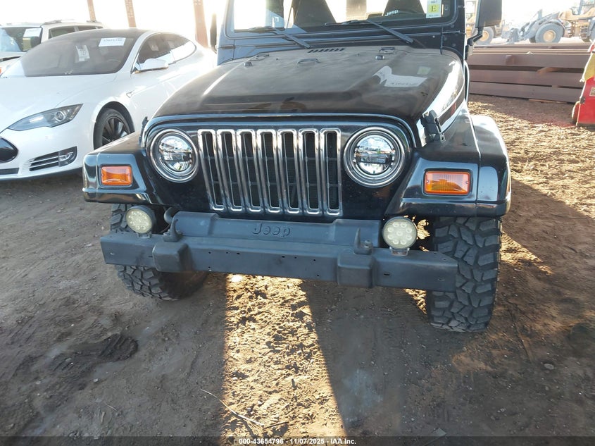 2001 Jeep Wrangler Sport VIN: 1J4FA49S41P355128 Lot: 43654796