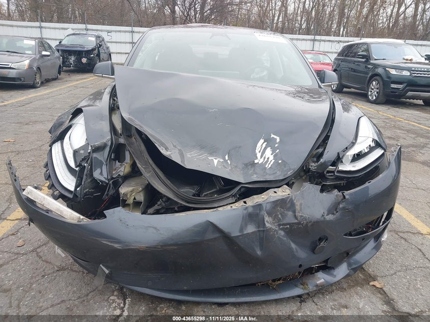 2018 Tesla Model 3 Long Range/Performance VIN: 5YJ3E1EB9JF103709 Lot: 43655298