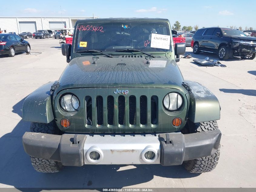 2007 Jeep Wrangler Unlimited Sahara VIN: 1J8GA59147L161506 Lot: 43655402