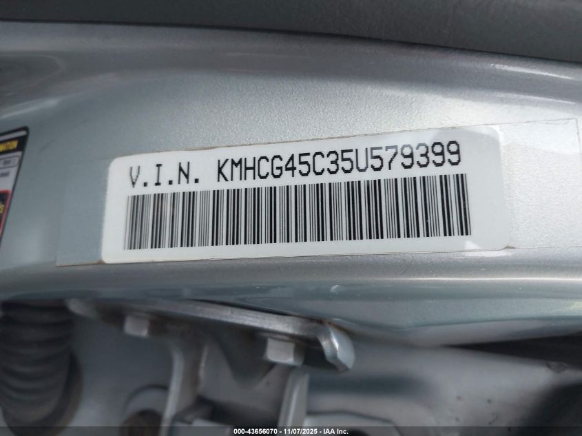 2005 Hyundai Accent Gls VIN: KMHCG45C35U579399 Lot: 43656070