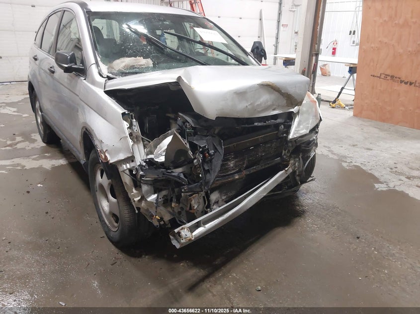 2009 Honda Cr-V Lx VIN: JHLRE48399C000172 Lot: 43656622