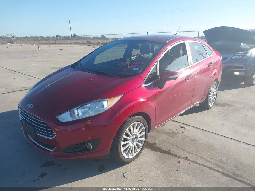 2016 Ford Fiesta Titanium VIN: 3FADP4CJ3GM175185 Lot: 43657069