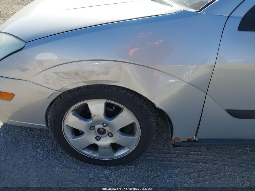 2001 Ford Focus Zx3 VIN: 3FAFP31311R210954 Lot: 43657370