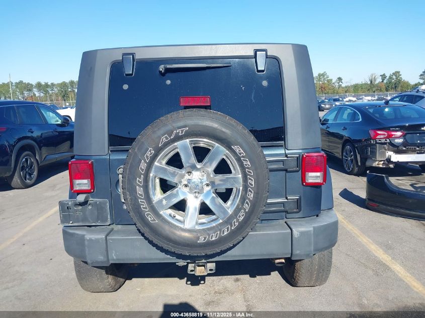 2007 Jeep Wrangler Unlimited Sahara VIN: 1J4GA59167L190667 Lot: 43658819