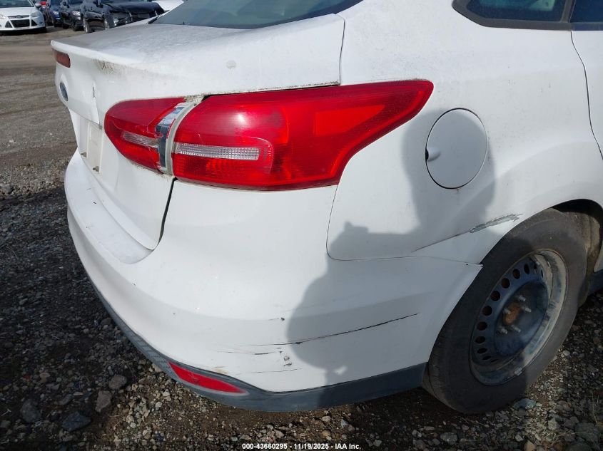 2015 Ford Focus S VIN: 1FADP3E29FL281558 Lot: 43660295
