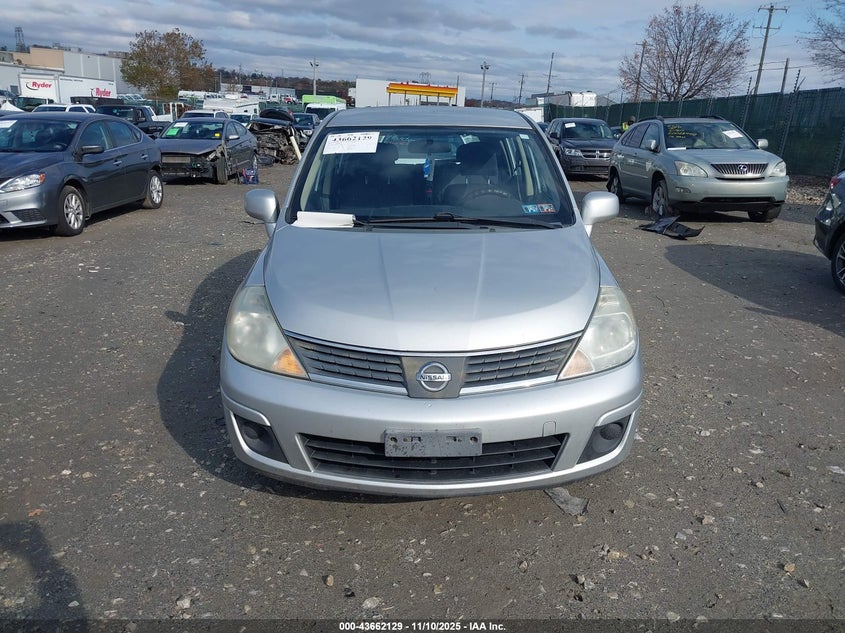 2009 Nissan Versa 1.8Sl VIN: 3N1BC13E69L354878 Lot: 43662129