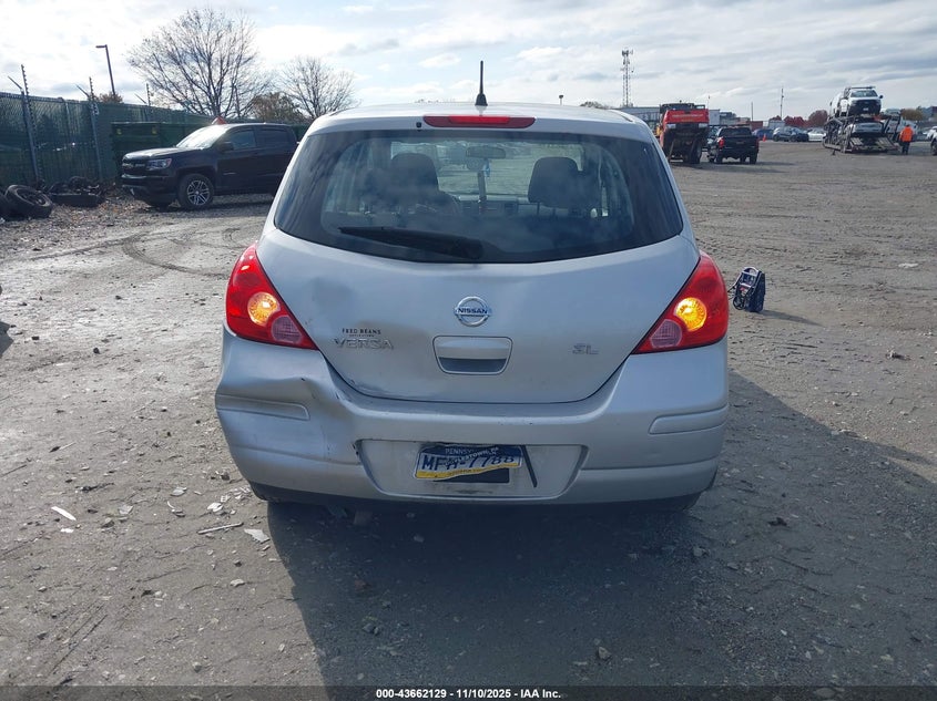 2009 Nissan Versa 1.8Sl VIN: 3N1BC13E69L354878 Lot: 43662129