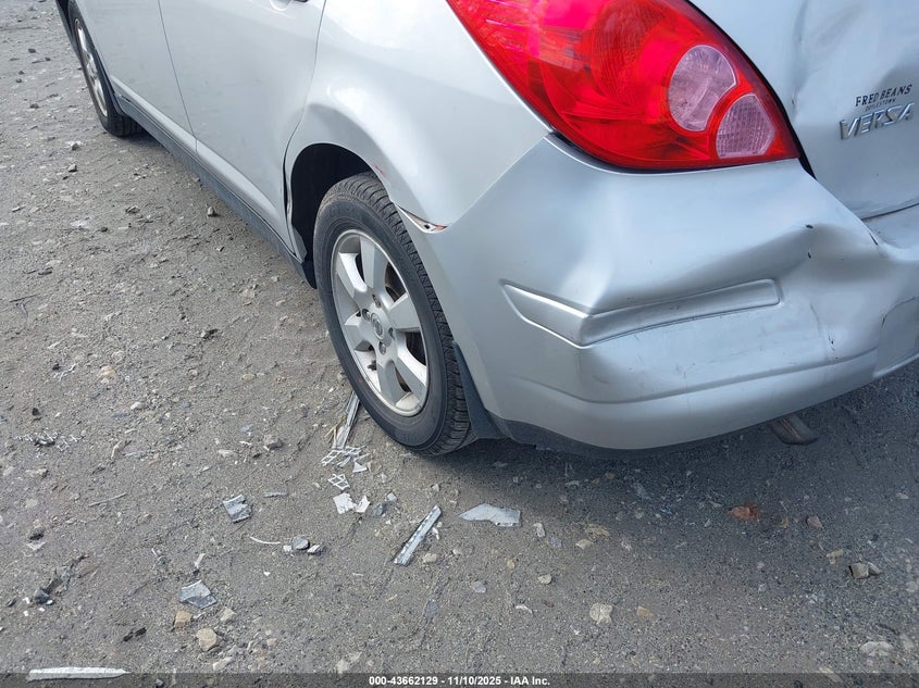 2009 Nissan Versa 1.8Sl VIN: 3N1BC13E69L354878 Lot: 43662129