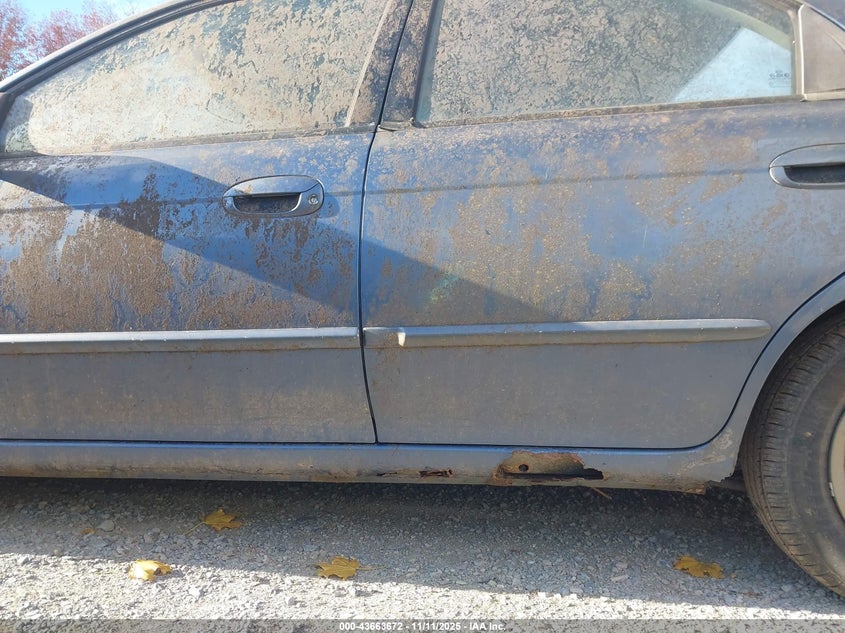 2003 Kia Spectra Ls VIN: KNAFB121X35275220 Lot: 43663672