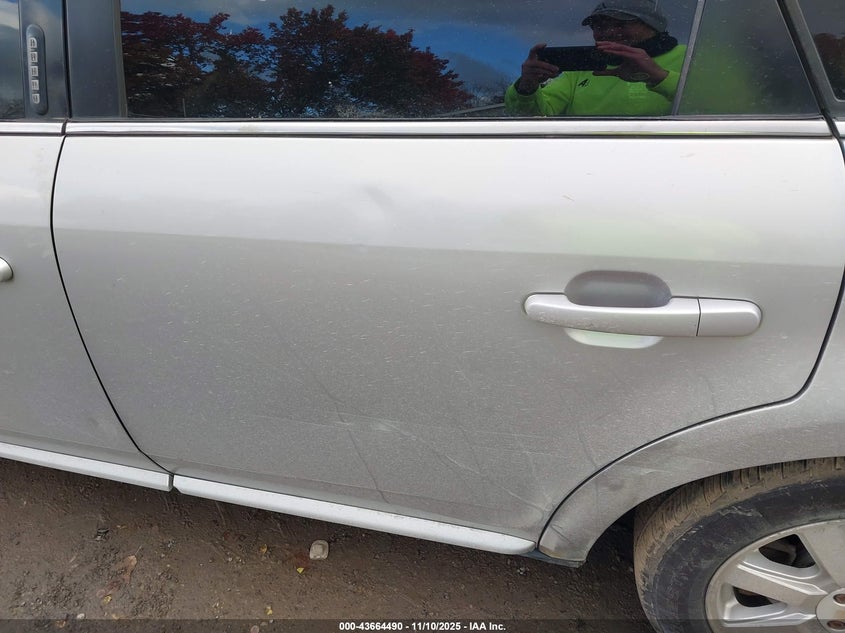 2009 Ford Taurus Se VIN: 1FAHP23WX9G119677 Lot: 43664490