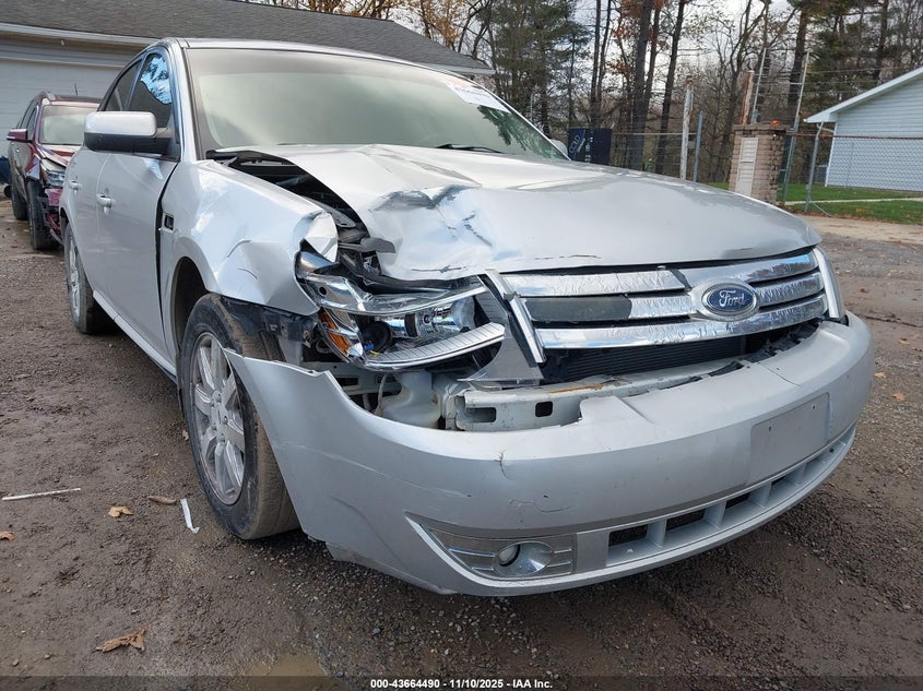 2009 Ford Taurus Se VIN: 1FAHP23WX9G119677 Lot: 43664490