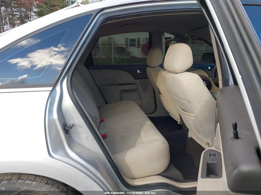 2009 Ford Taurus Se VIN: 1FAHP23WX9G119677 Lot: 43664490