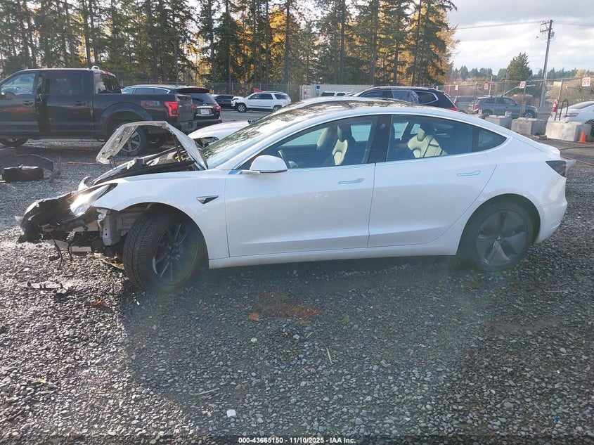 2019 Tesla Model 3 Long Range/Performance VIN: 5YJ3E1EB4KF211771 Lot: 43665150