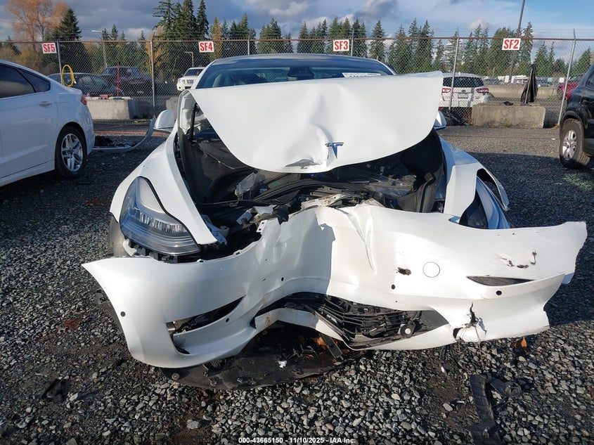 2019 Tesla Model 3 Long Range/Performance VIN: 5YJ3E1EB4KF211771 Lot: 43665150