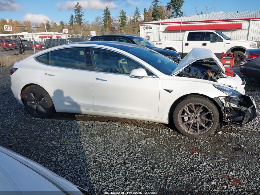 2019 Tesla Model 3 Long Range/Performance VIN: 5YJ3E1EB4KF211771 Lot: 43665150