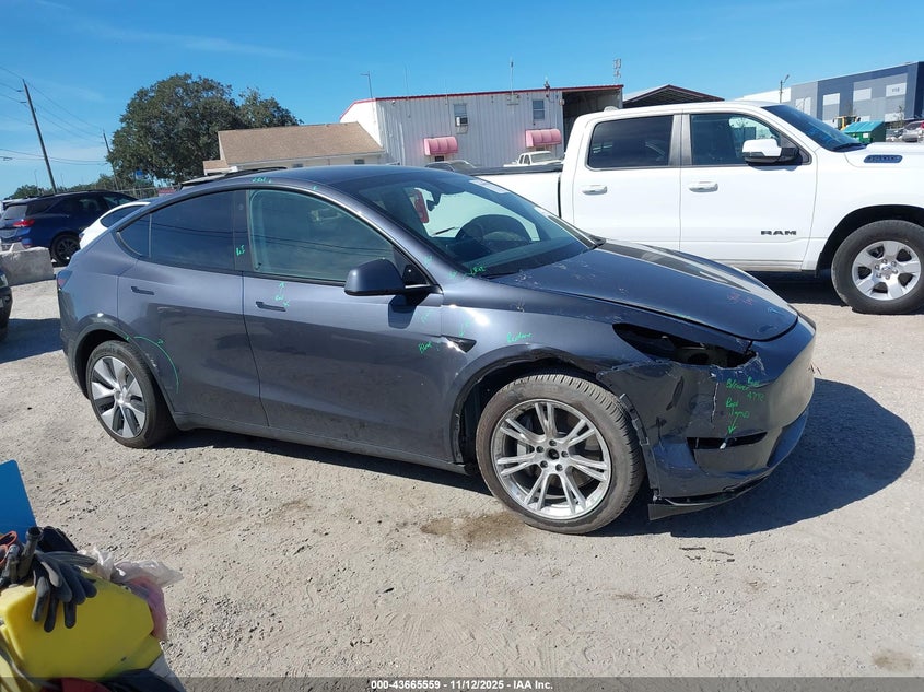 2023 Tesla Model Y Awd/Long Range Dual Motor All-Wheel Drive VIN: 7SAYGAEE1PF769999 Lot: 43665559