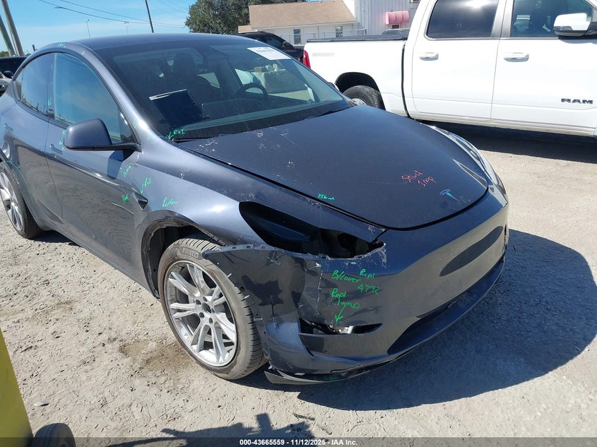 2023 Tesla Model Y Awd/Long Range Dual Motor All-Wheel Drive VIN: 7SAYGAEE1PF769999 Lot: 43665559