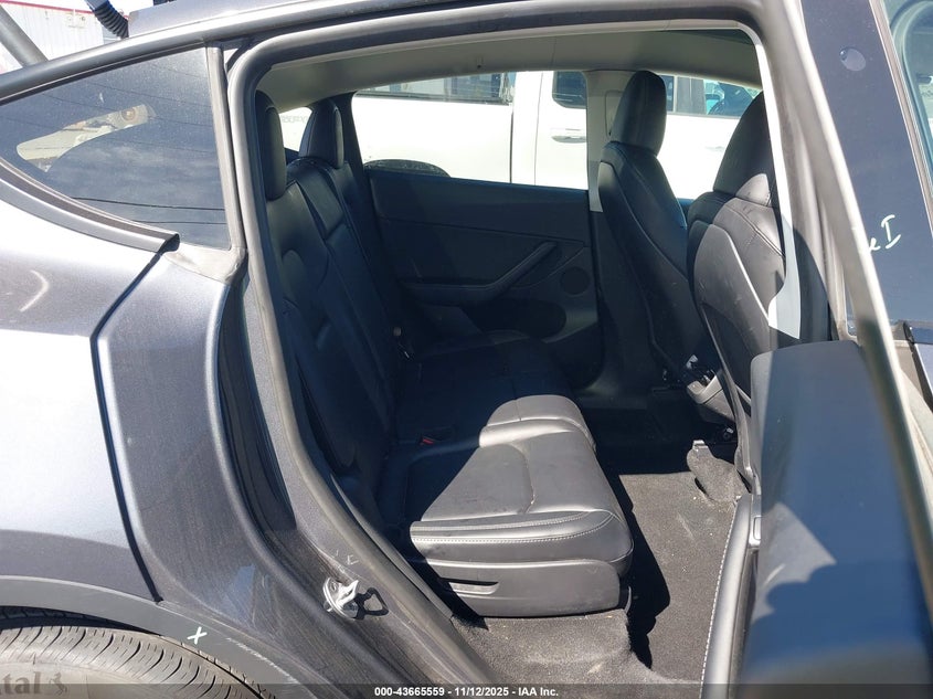 2023 Tesla Model Y Awd/Long Range Dual Motor All-Wheel Drive VIN: 7SAYGAEE1PF769999 Lot: 43665559