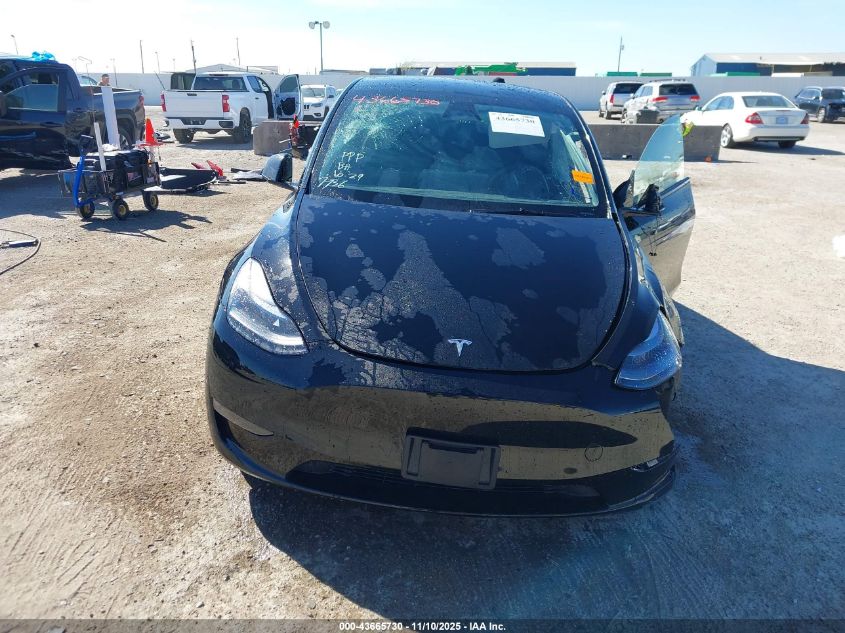 2025 Tesla Model Y Long Range Dual Motor Rear-Wheel Drive VIN: 7SAYGDED9SA347736 Lot: 43665730