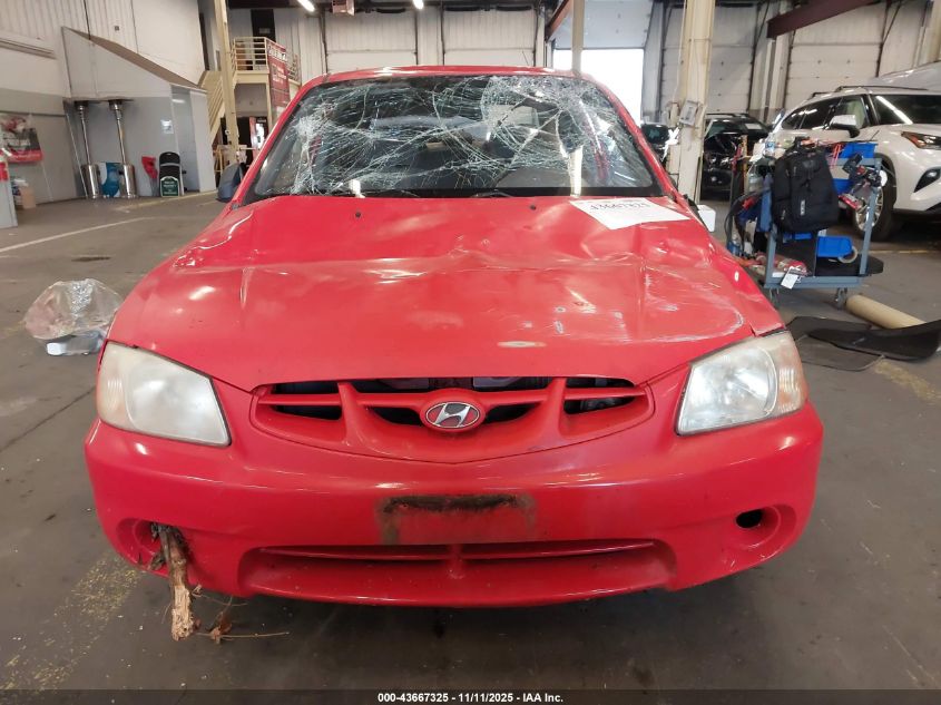 2002 Hyundai Accent L VIN: KMHCF35G92U164874 Lot: 43667325