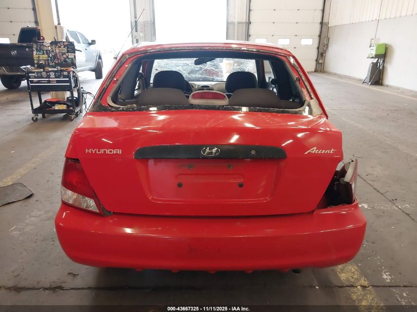 2002 Hyundai Accent L VIN: KMHCF35G92U164874 Lot: 43667325