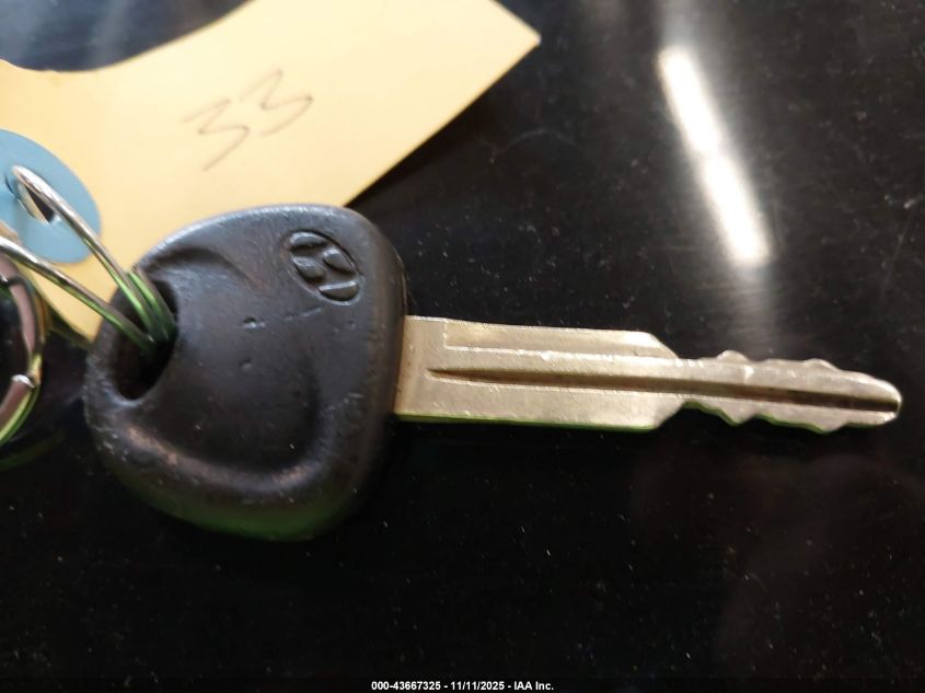 2002 Hyundai Accent L VIN: KMHCF35G92U164874 Lot: 43667325