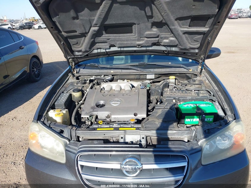 2002 Nissan Maxima Gle VIN: JN1DA31A92T316587 Lot: 43668058