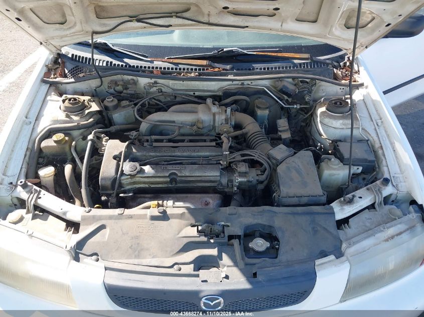 1998 Mazda Protege Dx/Lx VIN: JM1BC1411W0218000 Lot: 43668274