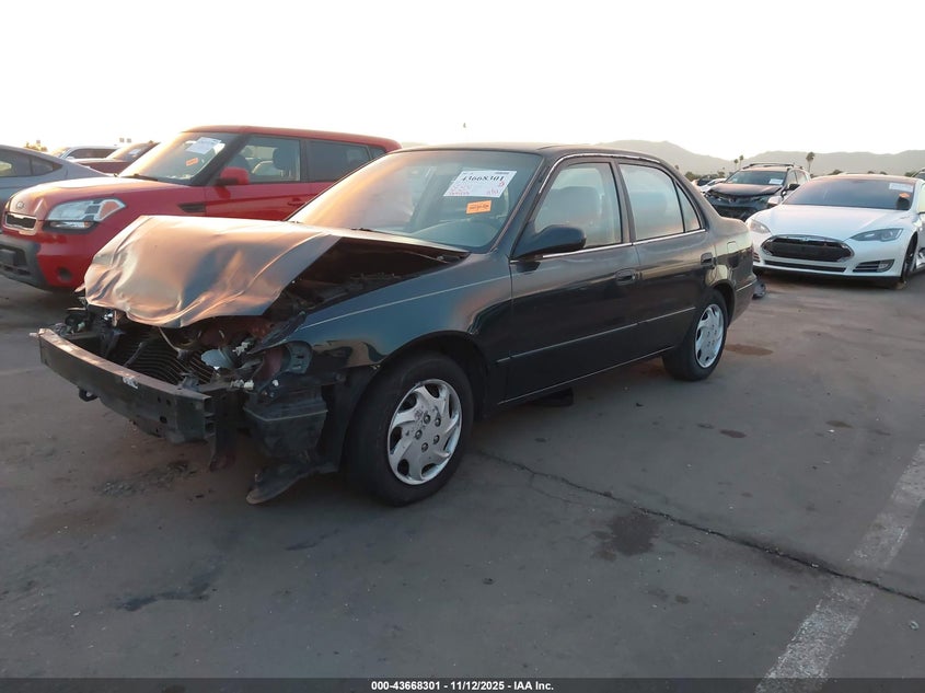 1NXBR12EXXZ252527 1999 TOYOTA COROLLA photo no. 2
