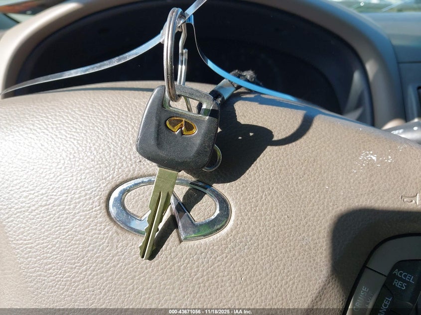 2001 Infiniti I30 Luxury VIN: JNKCA31A61T038267 Lot: 43671056