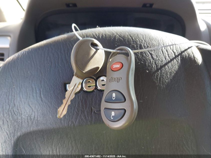 2004 Jeep Grand Cherokee Laredo VIN: 1J4GW48S14C219848 Lot: 43671492