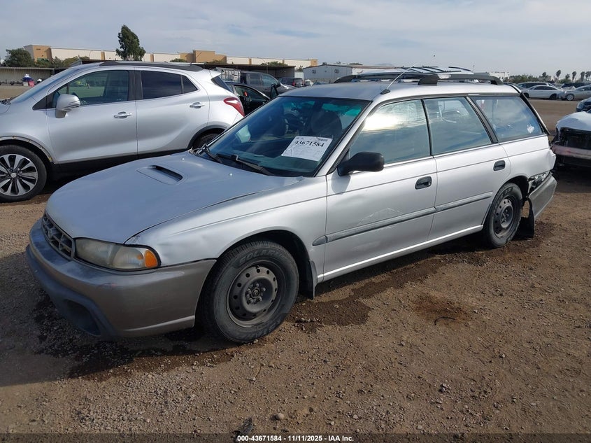 1997 Subaru Legacy L/Postal Right-Hand Drive VIN: 4S3BK4357V7318987 Lot: 43671584