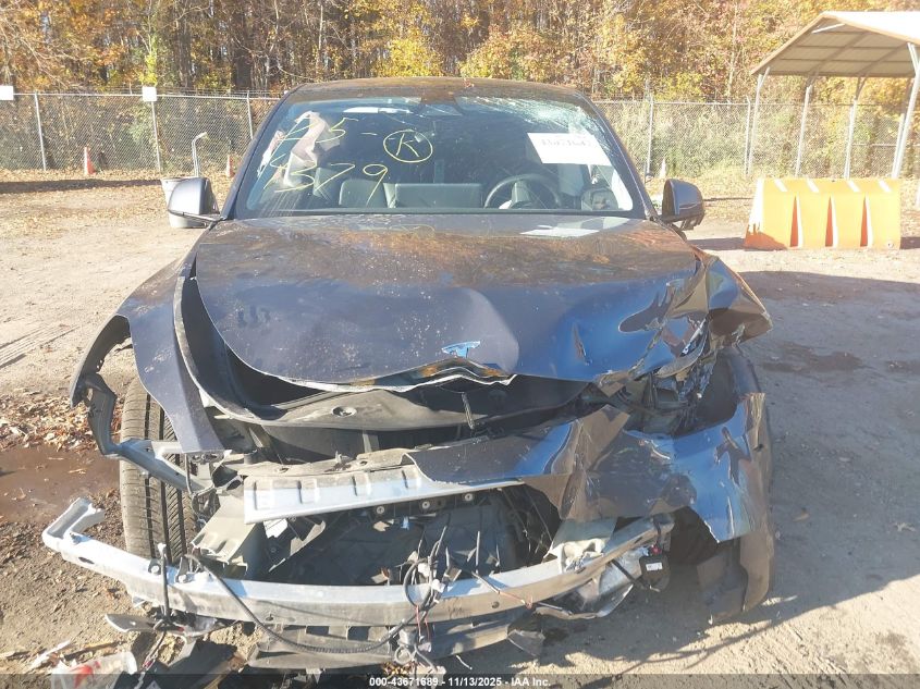 2023 Tesla Model Y Awd/Long Range Dual Motor All-Wheel Drive VIN: 7SAYGAEE9PF948825 Lot: 43671689