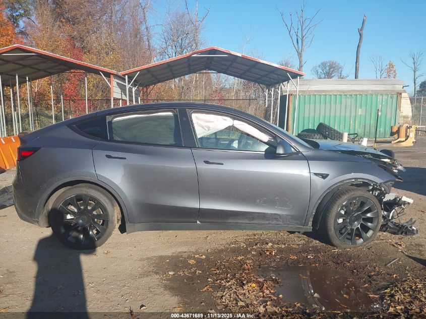 2023 Tesla Model Y Awd/Long Range Dual Motor All-Wheel Drive VIN: 7SAYGAEE9PF948825 Lot: 43671689