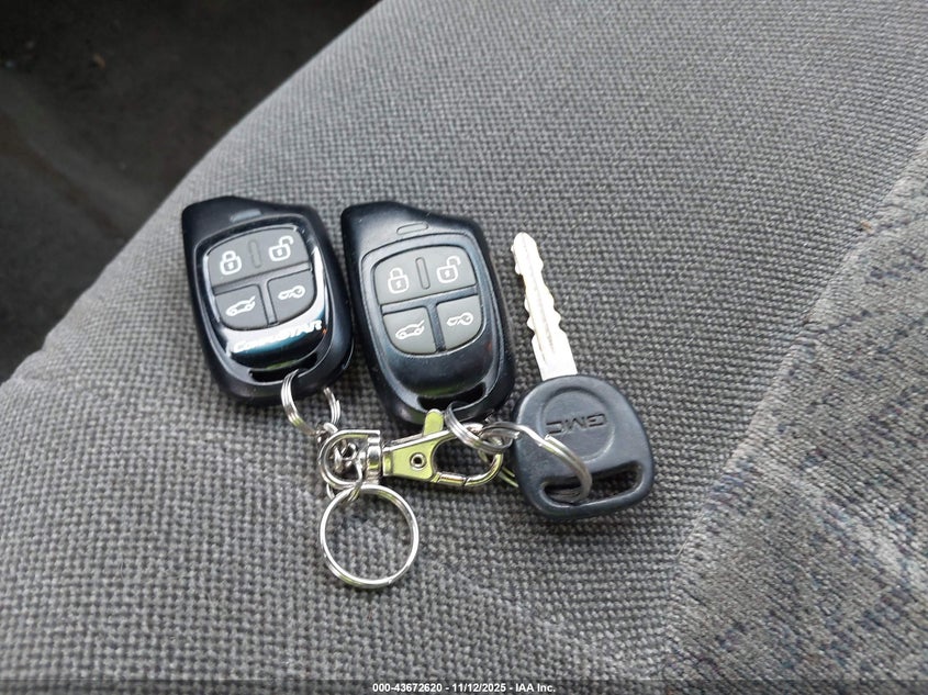 2003 GMC Envoy Sle VIN: 1GKDT13S232403311 Lot: 43672620